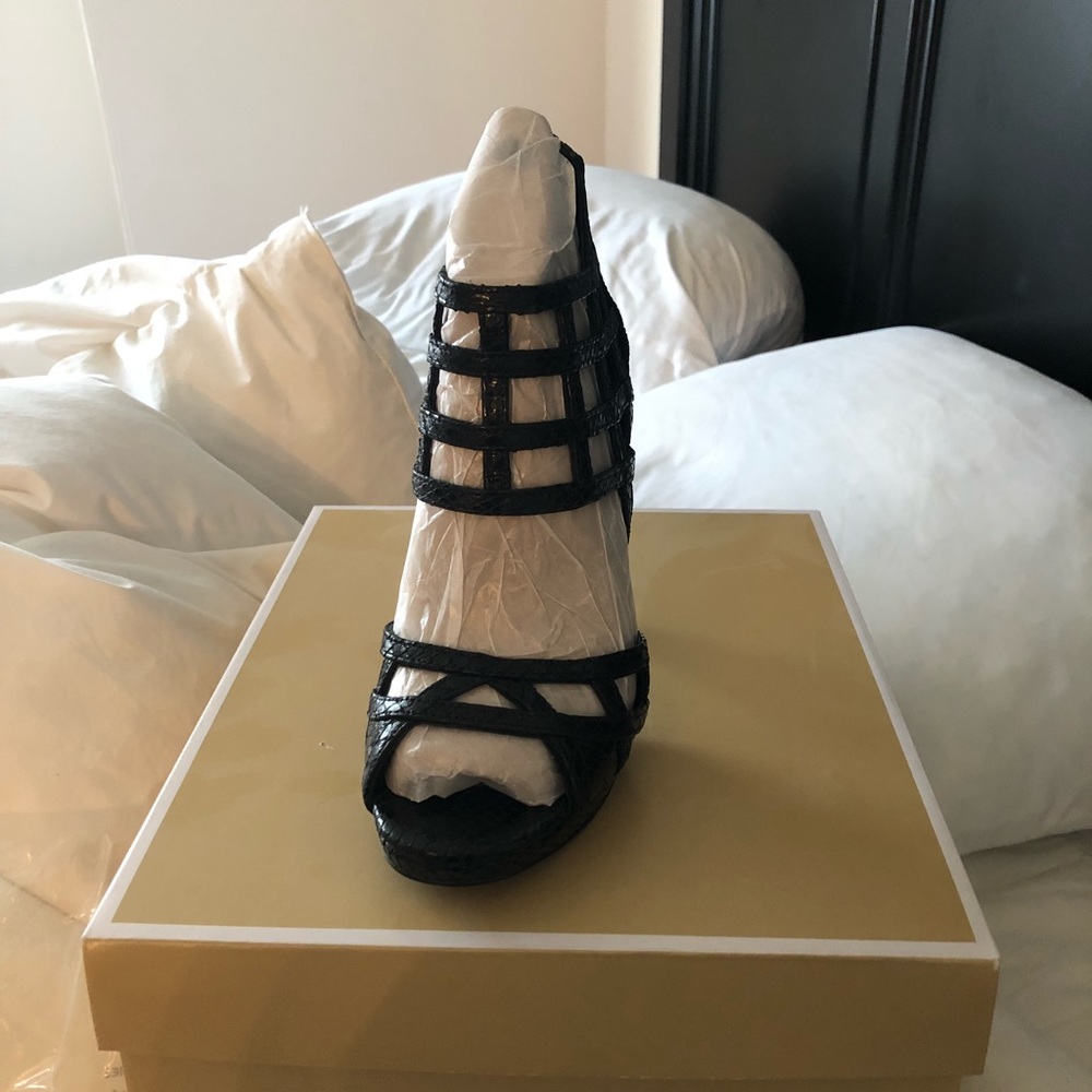 MK black heels.